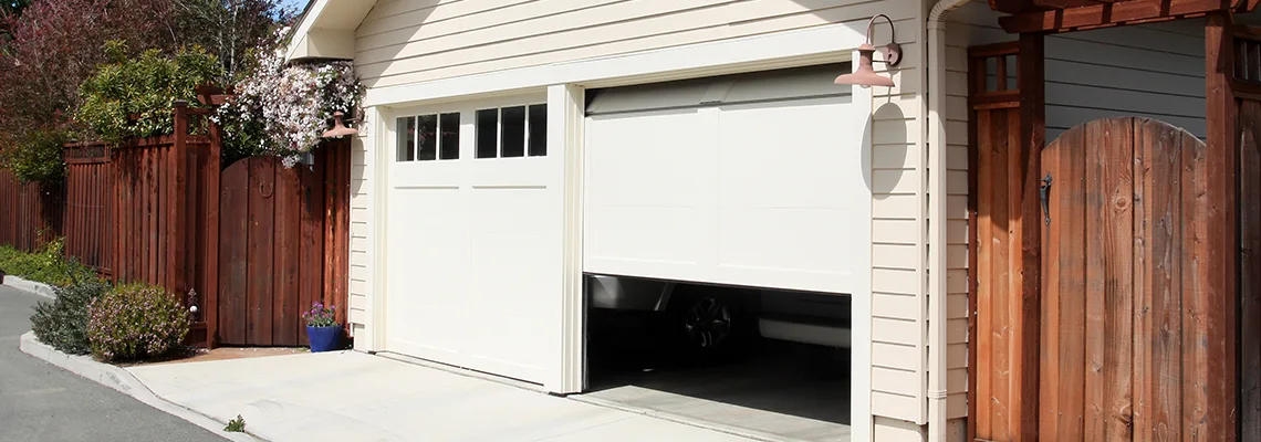 Fix Metal Garage Door Jerking in Coral Gables, Florida